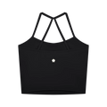 A black sports bra with a wide, structured cup design and thin crisscross straps at the back, featuring a small white flower logo on the center chest.